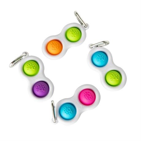 Брелок-антистрес Fat Brain Toys Simpl Dimpl Кнопки 4 кольори в асорт. (F2111ML) - фото 0
